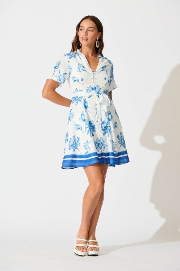 241114_StFrock_Milly_PM_30240407-1-WHT-BLU-FLO_0186.jpg Dress in White with Blue Flower Border Linen Blend