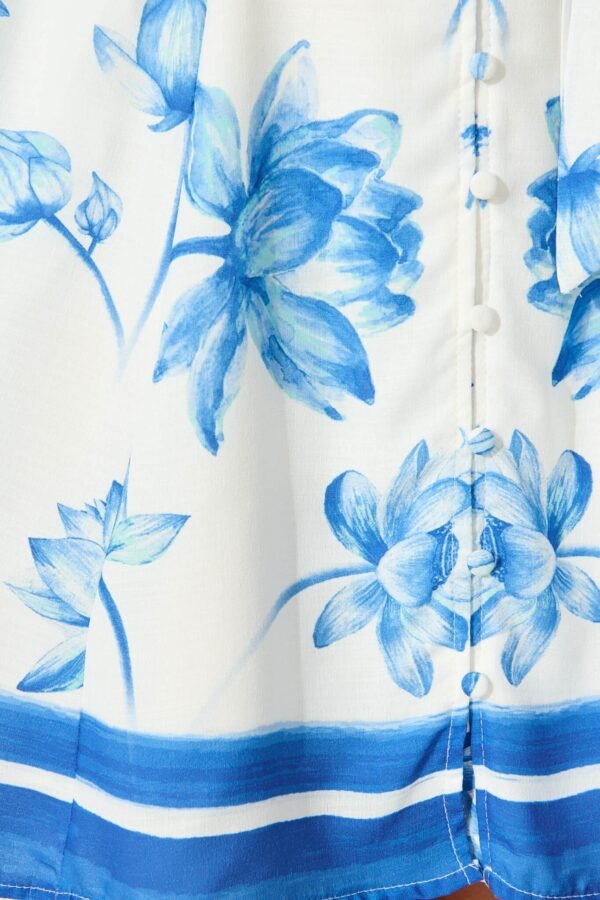 241114_StFrock_Milly_PM_30240407-1-WHT-BLU-FLO_0211.jpg Dress in White with Blue Flower Border Linen Blend