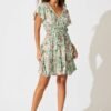 241121_StFrock_Milly_AM_A57419-WHT-GRN-FLO_0517.jpg Dress In White With Teal Floral